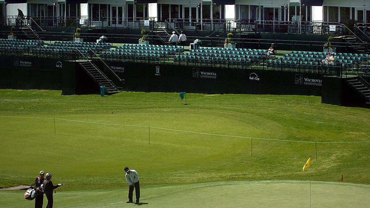 4/29/2008 Players practice Tuesday on #18 green near corporate hospitality tents for the upcoming Wachovia Championship at Quail Hollow Club in Charlotte.LAYNE BAILEY - lbailey@charlotteobserver.com