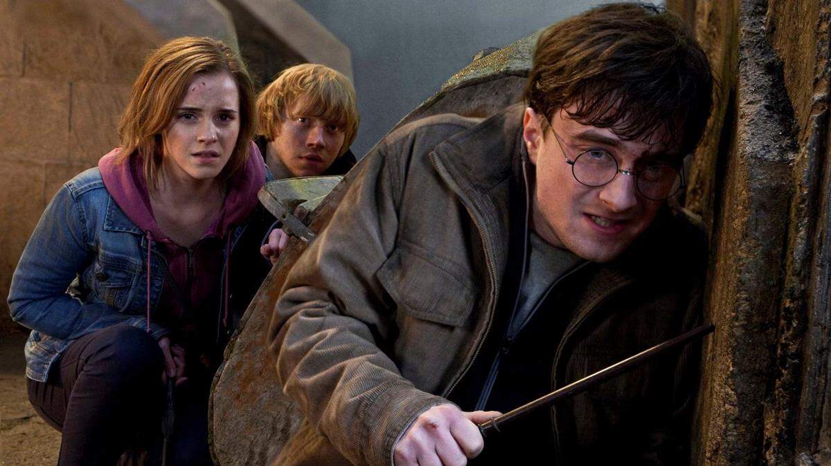 FILE-   In this file film publicity image released by Warner Bros. Pictures, from left, Emma Watson, Rupert Grint and Daniel Radcliffe are shown in a scene from "Harry Potter and the Deathly Hallows: Part 2."   (AP Photo/Warner Bros. Pictures, Jaap Buitendijk, File)