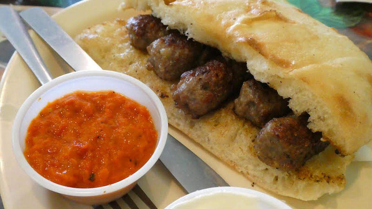 Cevapi sausages nestle into lepinja bread at Bosna Market/Euro Grill on Central Avenue. Photo by Tom Hanchett