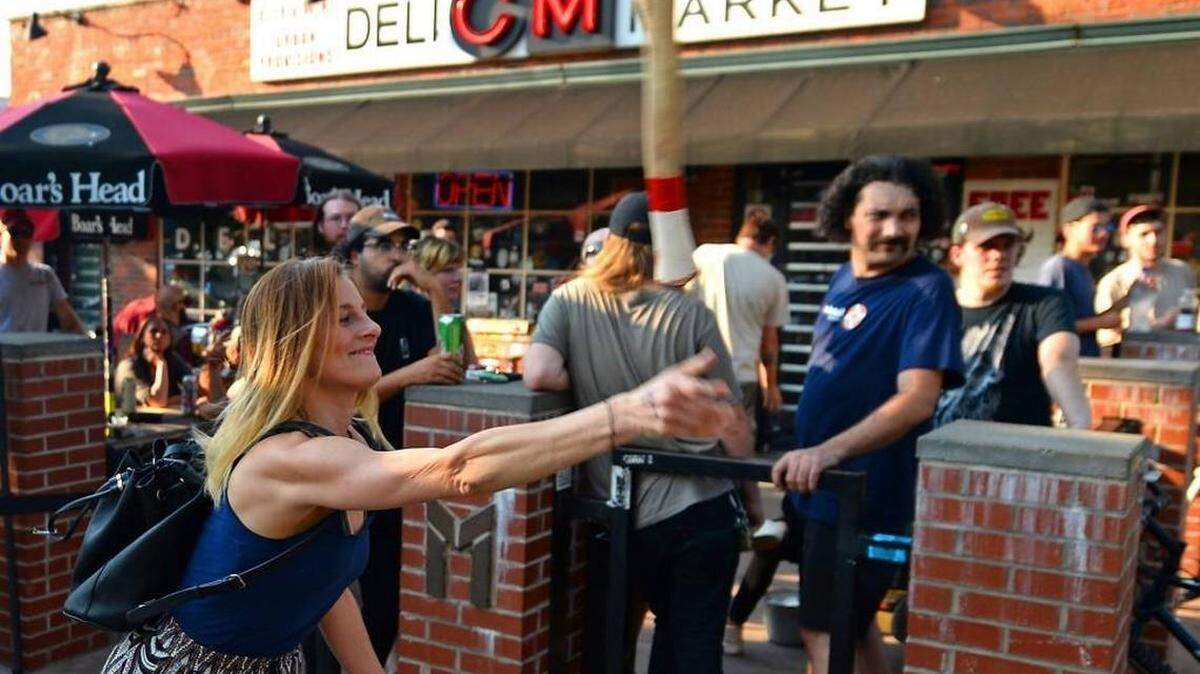 Patrons of the Common Market in Plaza Midwood were able to test their ability to throw an axe during a mobile event hosted Lumberjaxe on Thursday,