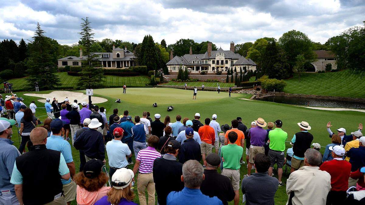 Fans gather around the seventh green at Quail Hollow Club in Charlotte at the 2016 Wells Fargo Championship. This year’s tournament was canceled due to the pandemic.