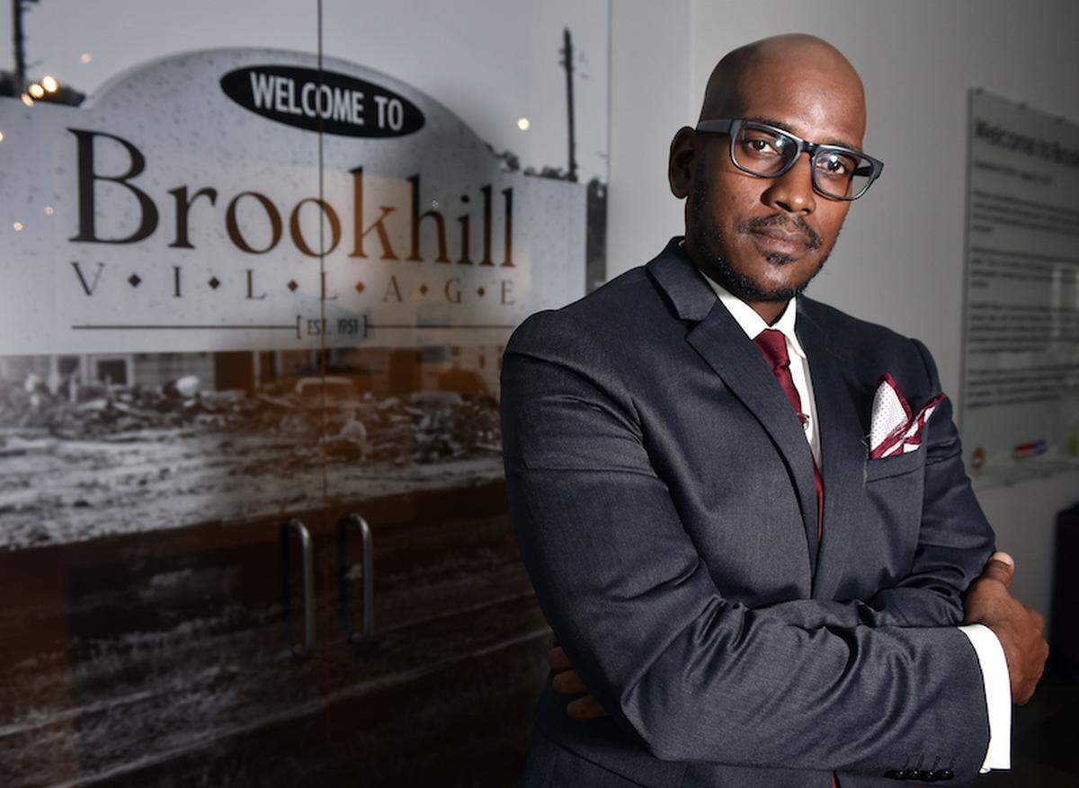 Courtesy of the Harvey B. Gantt Center for African-American Arts + Culture<br/>Welcome to Brookhill exhibit by Alvin C. Jacobs Jr.