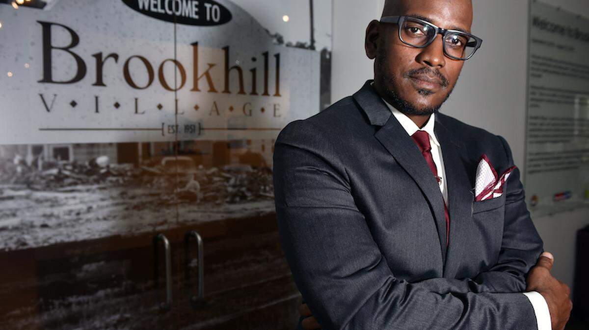 Courtesy of the Harvey B. Gantt Center for African-American Arts + Culture<br/>Welcome to Brookhill exhibit by Alvin C. Jacobs Jr.