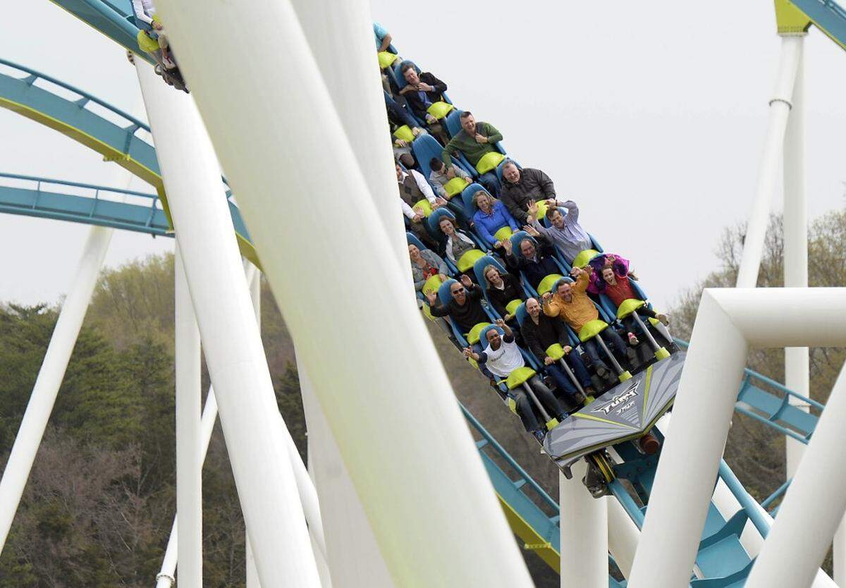 Roller coaster riders enjoy their experience on Carowinds' new Fury 325, the world tallest and fastest giga coaster, during media day on Wednesday, March 25, 2015.