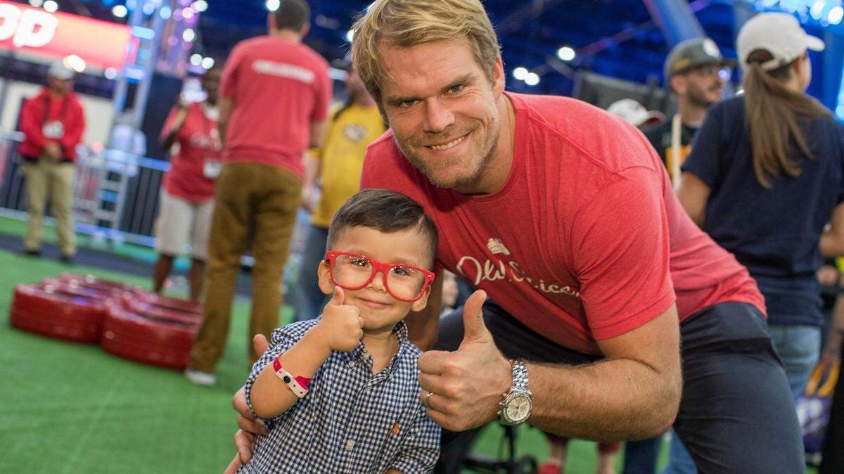 IMAGE DISTRIBUTED FOR OLD SPICE - Carolina Panthers Tight End Greg Olsen teams up with Old Spice at the Super Bowl LI NFL Experience fan festival in Houston, Thursday, Feb. 2, 2017. At the event, Old Spice showcased its Hardest Working Collection performance lineup of products, including its latest innovation, new Hydro Wash body wash. (Jeff Lewis/Invision for Old Spice/AP Images)