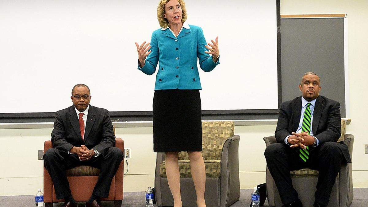Democratic mayoral candidates Michael Barnes, left, Jennifer Roberts, center, and David Howard, right, during a mayoral forum on April 9, 2015 at UNC Charlotte featuring three of the four Democratic candidates running for mayor. The forum, hosted by the UNCC College Democrats, was held at the Fretwell Building at UNC Charlotte and featured candidates Jennifer Roberts, Michael Barnes and David Howard. The candidates answered student submitted questions, and there was a student moderator. It was the first forum for all announced Democrats.