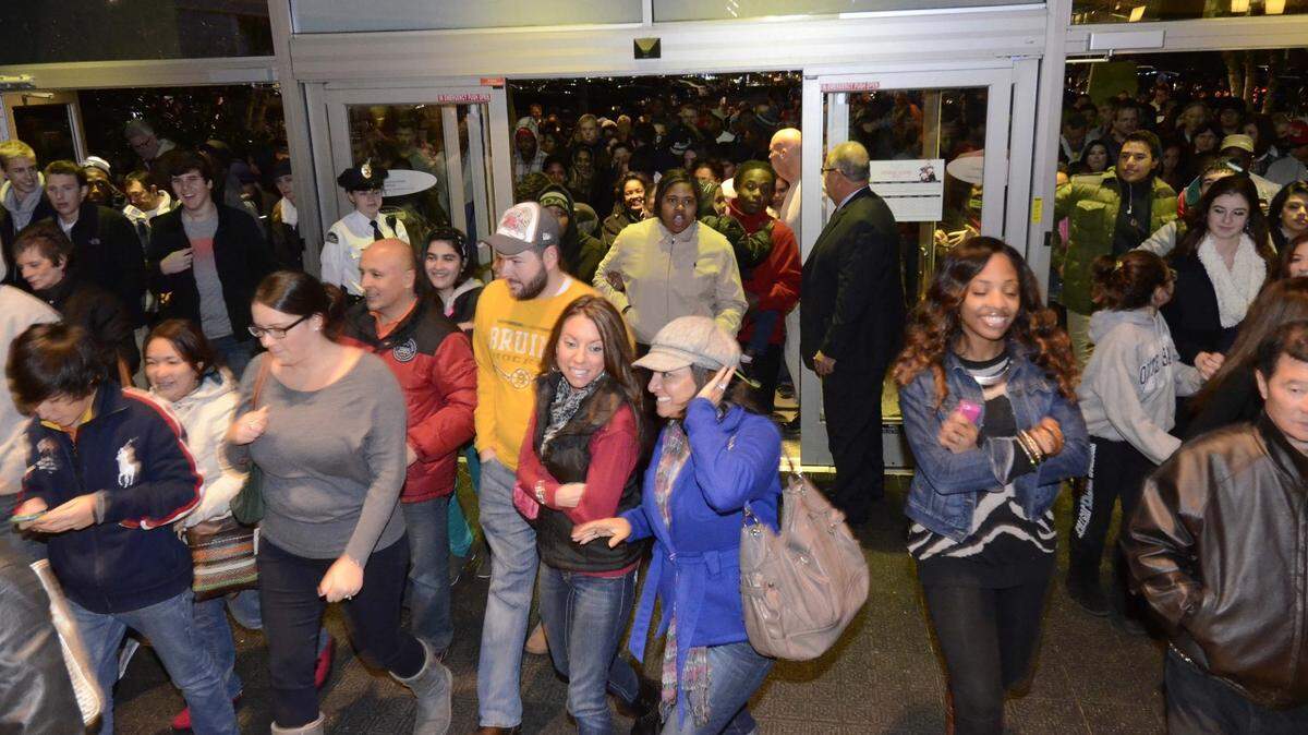Shoppers walk through the entrance at Concord Mills when the doors open at 8PM. Black Friday is happening early this year on Thanksgiving day, Nov. 28,2013. Robert  Lahser  - rlahser@charlotteobserver.com