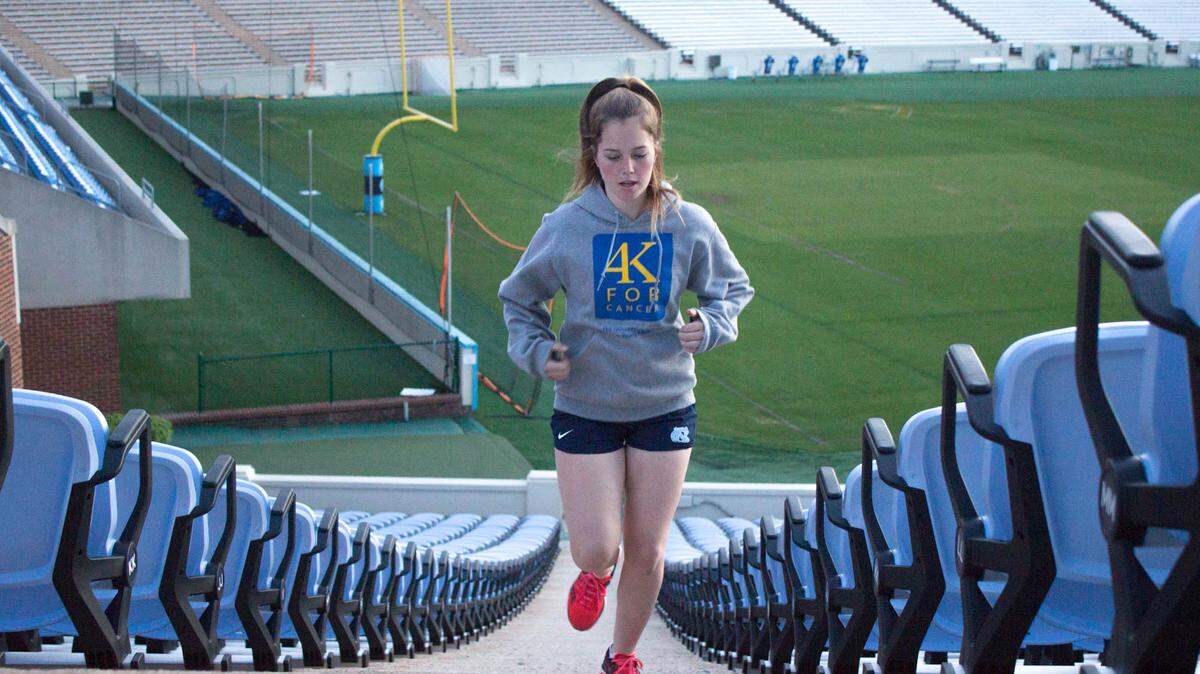 This summer, Grace Burud will embark on the Ulman Cancer Fund's 4K for Cancer. Here, she trains in UNC's Kenan Football Stadium.