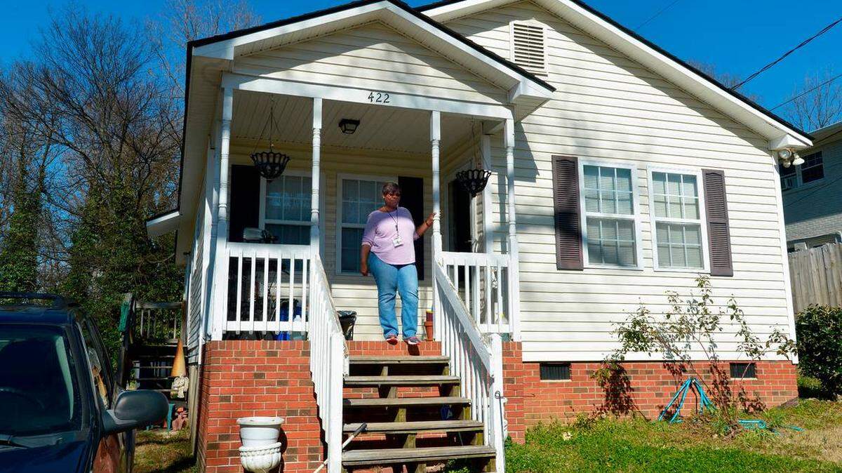 Diedra Laird/The Charlotte Observer<br/>
Leslie Williams, a school bus driver for Charlotte-Mecklenburg Schools, lives in a Habitat house in Seversville in the Johnson C. Smith University area. Her tax value jumped a 188 percent increase from its 2011 value.