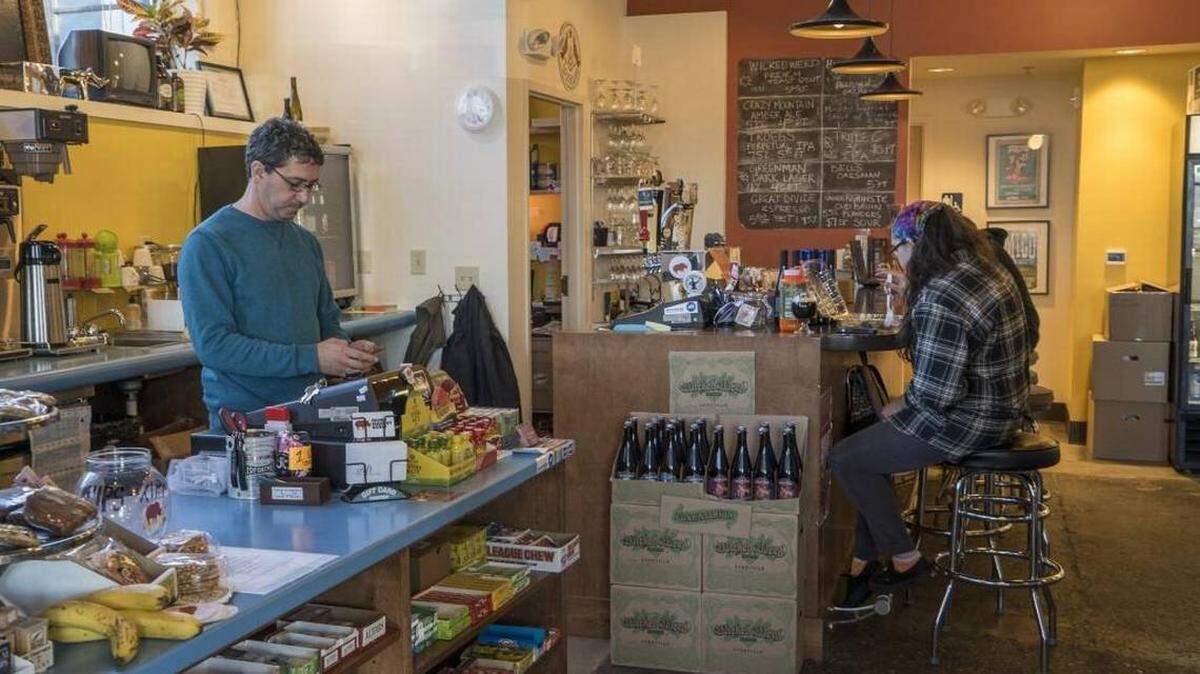 Rhino Market will open its third location early next year on North Davidson Street, in the same building as Free Range Brewing, according to Rhino owner Rob Rondelez, pictured above at his original market 1500 W. Morehead St. MARK HAMES mhames@charlotteobserver.com