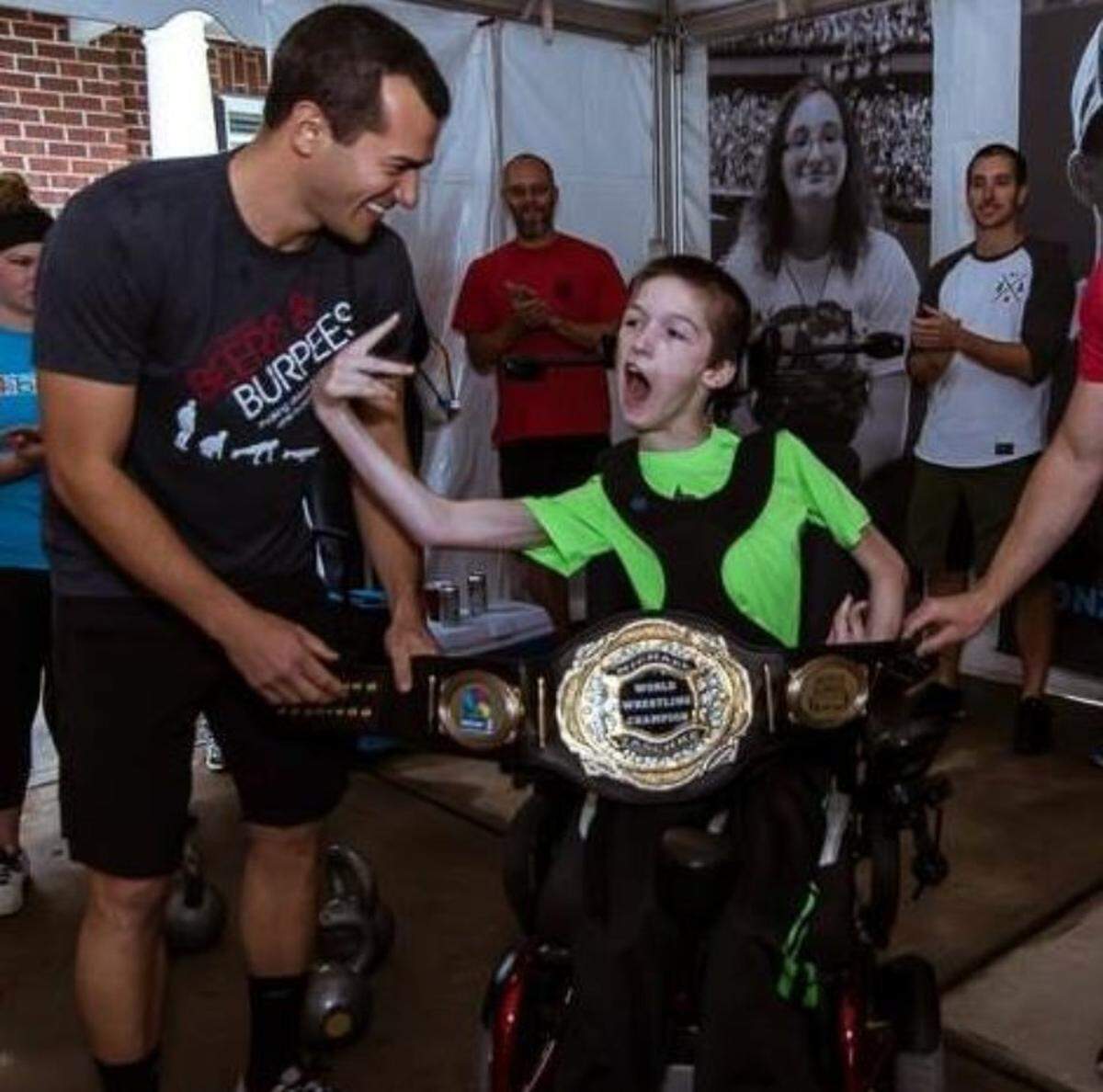 Mike Dascal with Michael T. His dream was to watch a WWE event live.