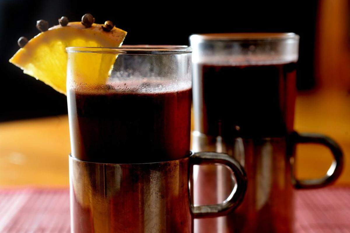 KATHI PURVIS WILL WRITE CAPTIONS FOR THESE. Food centerpiece for Charlotte and Raleigh: Winter drinks you need to know. We'll probably need two shots, a large one with a punch in a punch bowl and a smaller one with a single drink. This runs 10/29, so we want it to have a fall entertaining feel without looking too much like a Halloween party. So: Lots of orange, dark red and maybe even black, but no fake spiders or blood. Purvis will make the drinks and I'll have props. We'll definitely have a punch, a cranberry shrub and fizz, a mulled wine and a toddy.