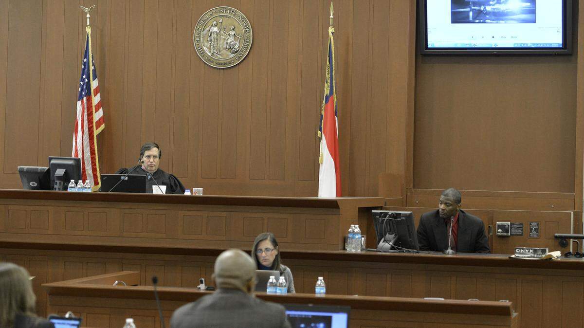 Officer Adam Neal watches the dash-cam  video taken from his patrol car the morning Jonathan Ferrell was shot and killed by Officer Randall "Wes" Kerrick.

Wednesday, Aug 05, 2015, is the third day of testimony in the voluntary manslaughter trial for Charlotte-Mecklenburg police Officer Randall "Wes" Kerrick, who is accused of wrongfully killing Jonathan Ferrell in a late-night encounter in 2013.

Kerrick is charged with voluntary manslaughter in the shooting death of 24-year-old Jonathan Ferrell on September 14, 2013, along Reedy Creek Road. Ferrell was unarmed and shot ten times.