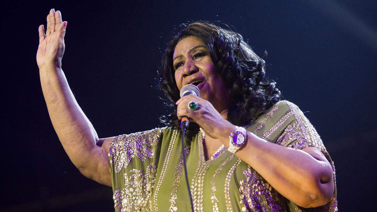 FILE - In this May 11, 2013 file photo, Aretha Franklin performs during McDonald's Gospelfest 2013 at the Prudential Center in Newark, N.J.Franklin won’t say what has caused her latest health problems, but says she’s had a “miraculous” recovery and is looking forward to performing soon.In a phone interview on Tuesday, Aug. 20,  Franklin said that she recently had a cat scan and that it showed she was 85 percent improved. The 71-year-old has canceled several concerts and public appearances and blamed it on unspecified treatment.   (Photo by Charles Sykes/Invision/AP, File)