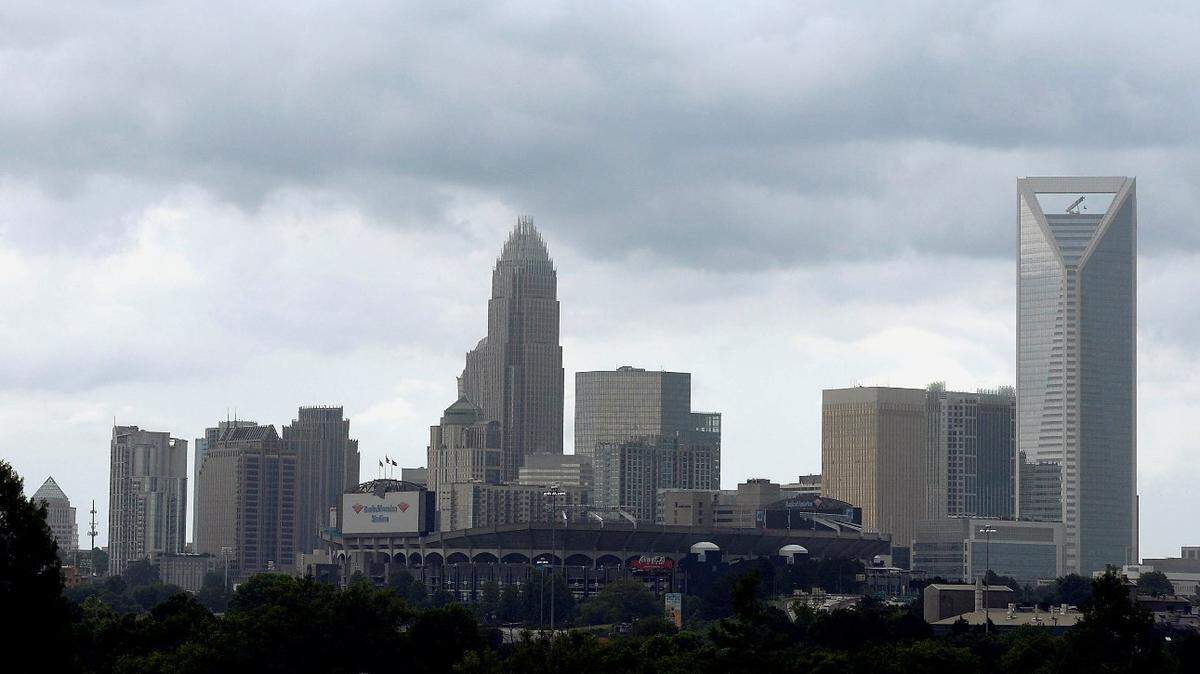 Rain clouds roll over the uptown Charlotte skyline on Tuesday afternoon, June 2, 2015, prompting a brief period of showers.
