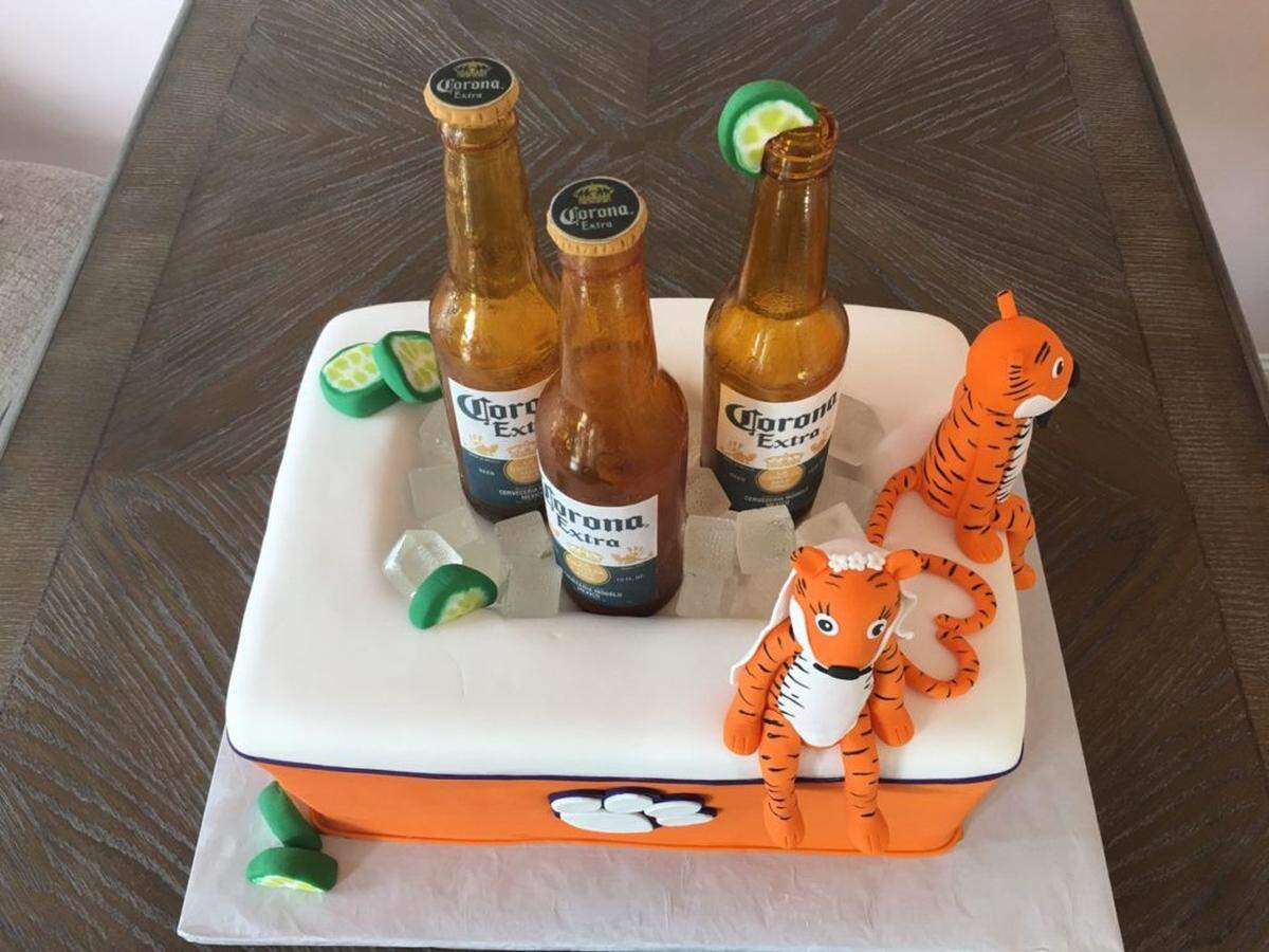 Clemson University tailgate themed groom's cake designed by Brandy Stimac with The Icing &amp; The Cake. Photo courtesy of The Icing &amp; The Cake.