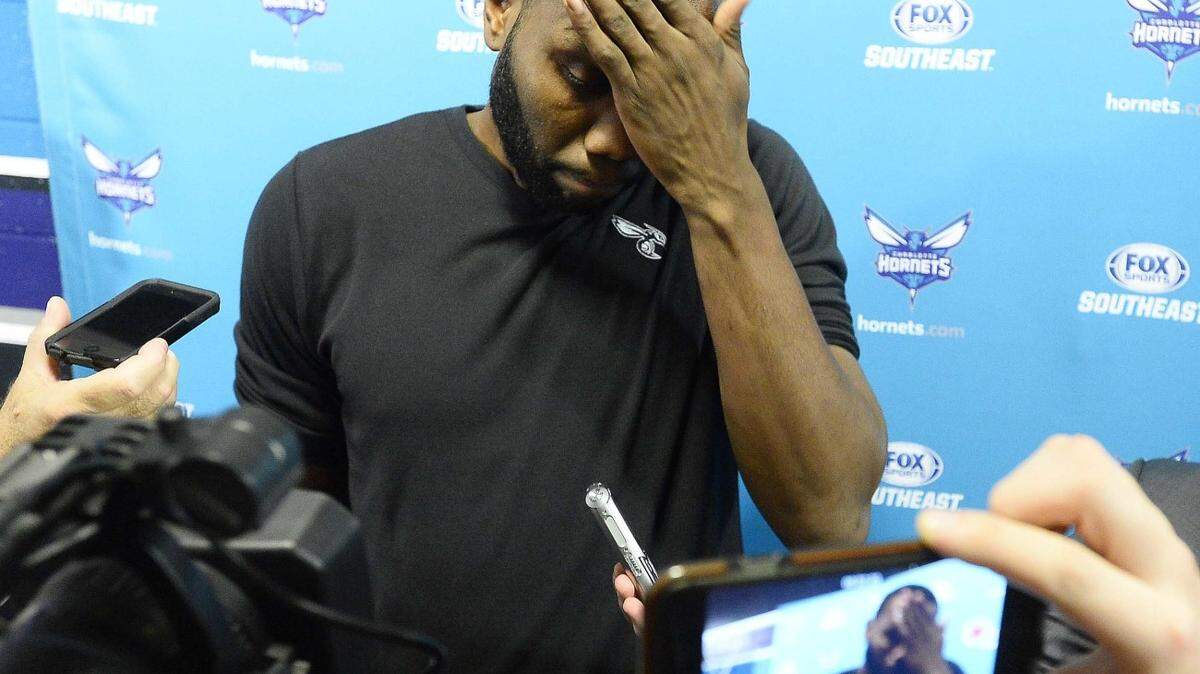 Charlotte Hornets center Al Jefferson wipes the sweat from his forehead after he spoke  to the media about his suspension before Wednesday night's game played at Time Warner Cable Arena,  Dec 08,2015.