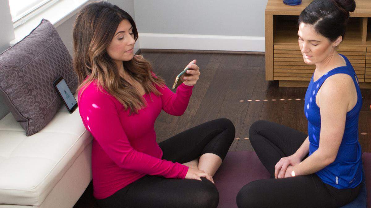 Photo by Alex Cason


Use your phone to summons local yoga teacher Nicole D’Alonzo, left, to your living room (virtually).