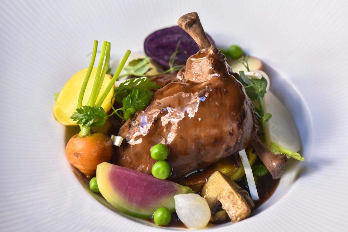 Pan Seared Duck with Turnips, Baby Carrots, Toasted Pepitas, Orange Segments, Trumpet Mushrooms, Leeks and Orange Demi-Glace.