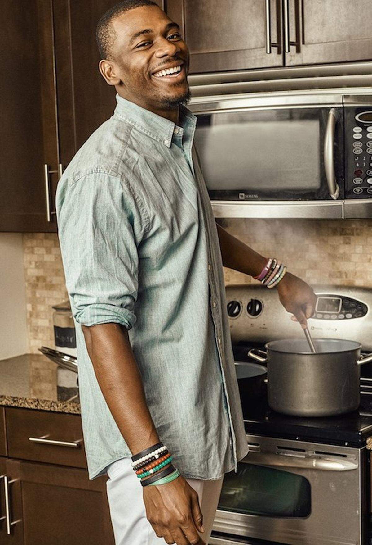 Devin Funchess in his South End kitchen. Photo by Joseph Bradley