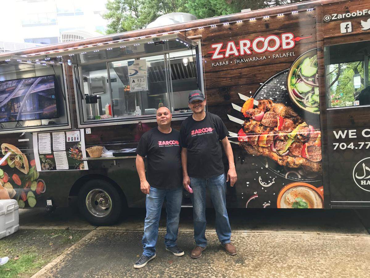 Abouelela in front of the Zaroob Food Truck
