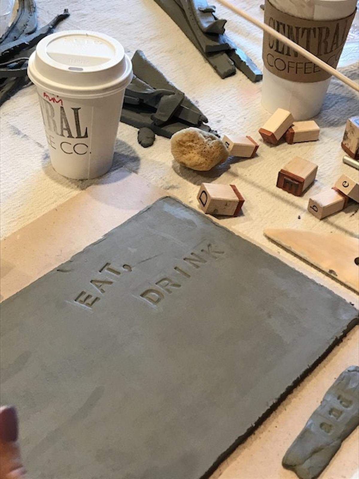 After putting an imprint on the clay, this piece gets set to head to the kiln