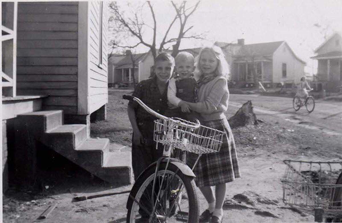 Carol and Tom Hopkins in their front yard on 37th Street, 1949