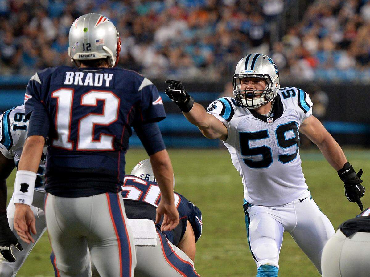 Carolina Panthers linebacker Luke Kuechly, right, yells out instructions to the defense against Tom Brady in 2015. While Kuechly played eight NFL seasons before retiring, Brady is now playing his 21st.