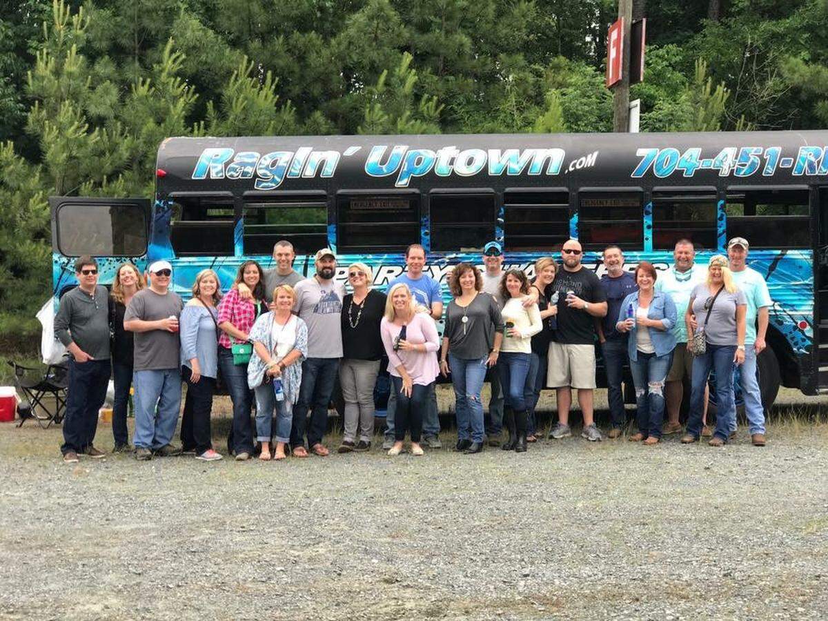 Celebrating her husband's birthday, Lewis and friends enjoy a party bus before the Chris Stapleton concert earlier this May.