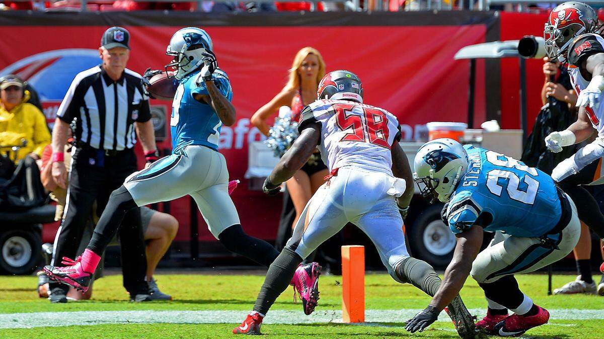 Carolina Panthers wide receiver Ted Ginn, Jr., left, runs into the end zone for a touchdown vs the Tampa Bay Buccaneers during third quarter action on Sunday, October 4, 2015 at Raymond James Stadium in Tampa, Fl. The Panthers defeated the Buccaneers 37-23.