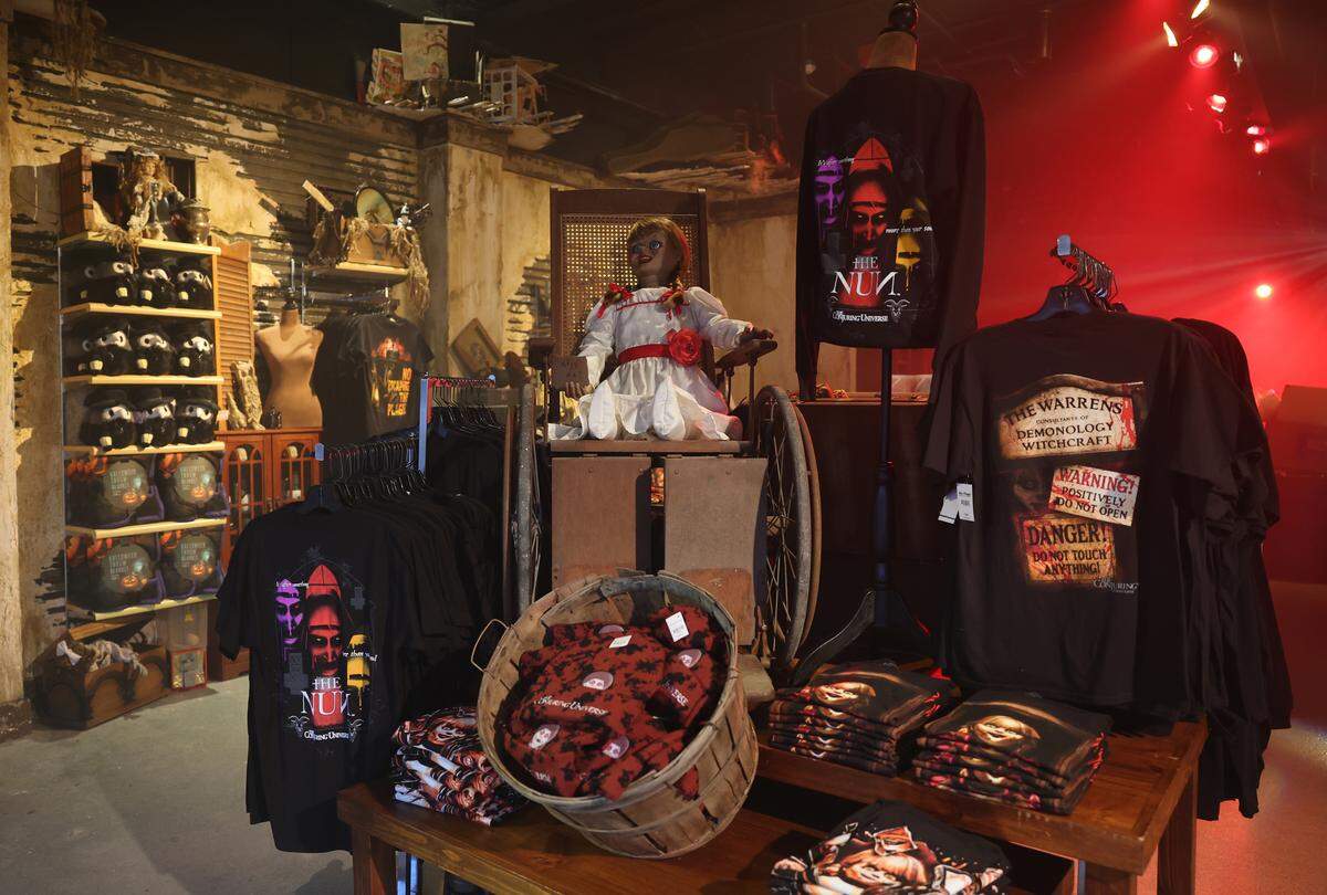 A gift shop is stocked with souvenirs from The Conjuring: Beyond Fear experience at Scarowinds on Tuesday, Sept. 9, 2025