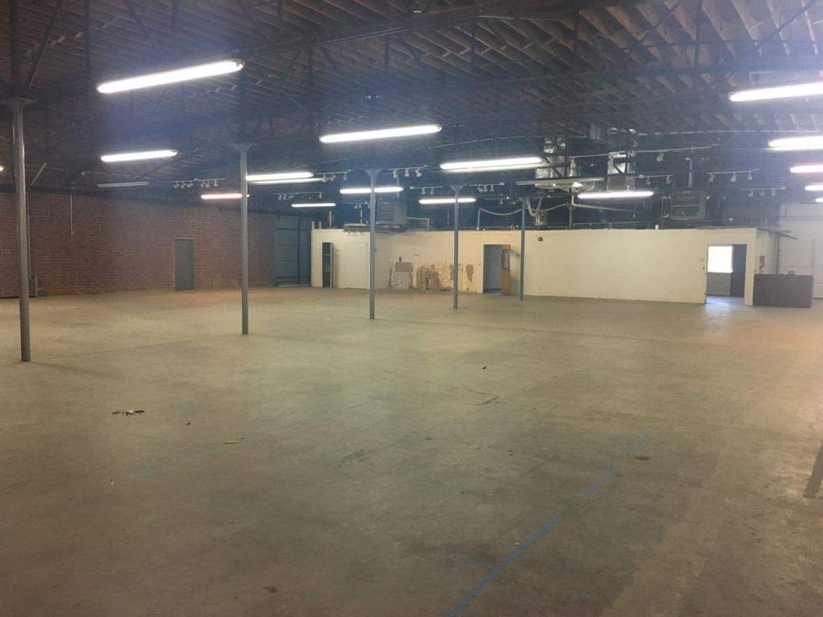 The inside of the new Alchemy at C3 Lab space, taken from what will be the bar area.