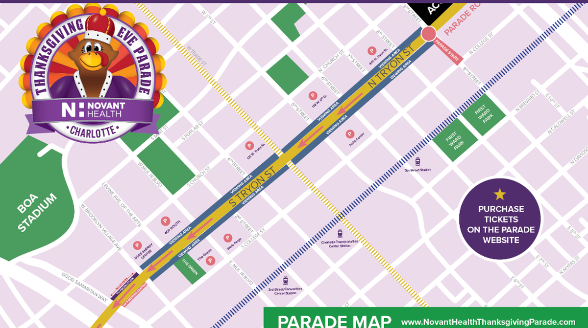 Map of the Novant Health Thanksgiving Eve Parade route in Charlotte, North Carolina. The route is marked by a yellow and magenta line, starting near the intersection of North Tryon Street and North College Street, proceeding south down North and South Tryon Street, and ending around the intersection of South Tryon Street and West M.L.K. Jr Boulevard. Key landmarks shown near the route include BOA Stadium, the Charlotte Transportation Center Station, 3rd Street Convention Center Station, and various viewing areas.