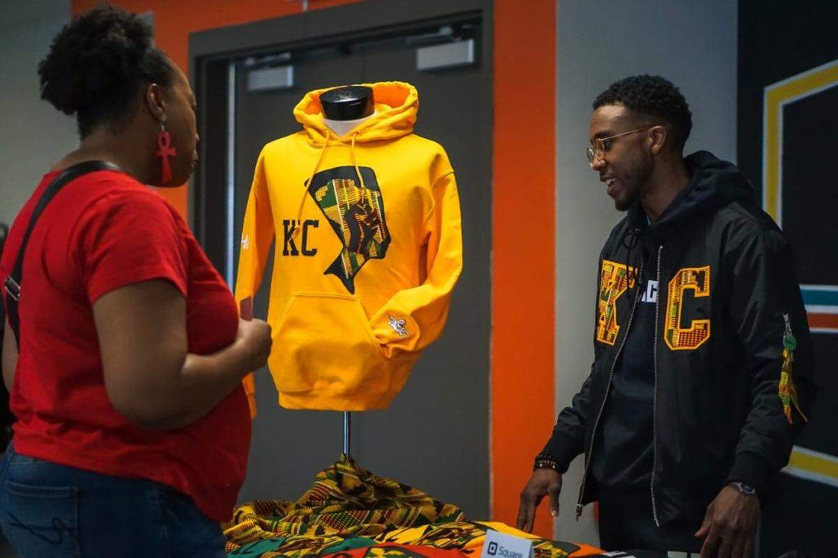 Courtesy of Jaired and Britney Epps. A shopper visits a Sip &amp; Support booth in Detroit.