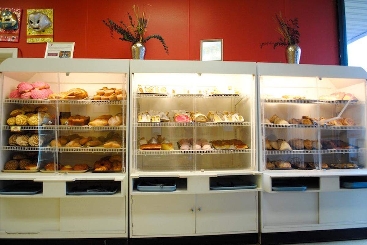 Freshly stocked pastry shelves at Las Delicias.
