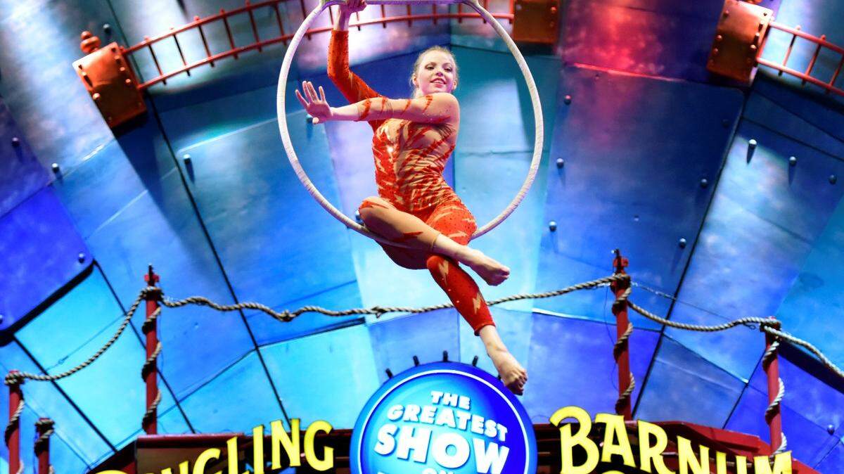 Aerialist Olha Peresada performs during the pre show before the Ringling Bros. and Barnum &amp; Bailey Circus begins at the Veterans Memorial Arena Thursday evening, Jan. 19, 2017, in Jacksonville, Fla. The circus is closing in May 2017. (Will Dickey/The Florida Times-Union via AP)