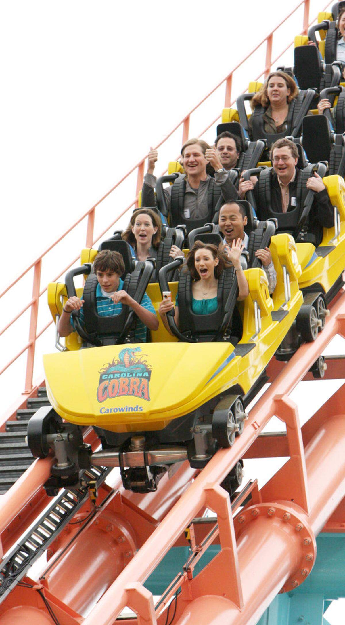 Folks ride the  Carolina Cobra roller coaster at Carowinds. file