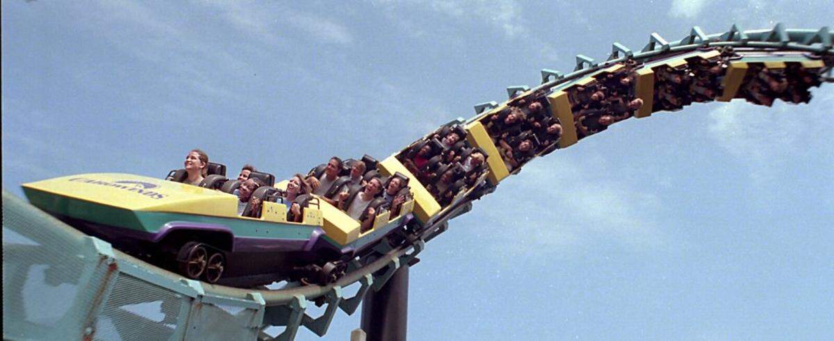 7/29/98 In the front car of Carolina Cyclone l-r front row volunteer Heidi Forsythe,15,and Malinda (CQ) Hayes,17; and l-r row behind them directors Garnet McKeown and Wendy Waddle, all of Camp ARC, riding Carolina Cyclone as part of a Rock Hill Camp ARCfield trip to Carowinds today. About 35 Camp ARC teenagers from the camp, run by Rock Hill Parks, Recreation and Tourism, attended Carowinds today from 10 am to 3 pm, riding the rides and having lunch at Plantation Pavilion. The camp has 2 field trips toCarowinds during its June 15-Aug 14 run (9 1-week sessions of 35 kids each during this time). Camp ARC has been visiting Carowinds for 10 years.