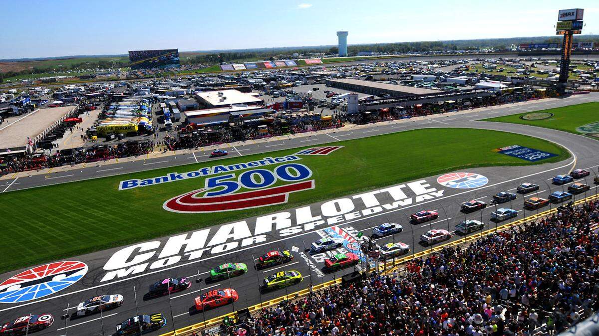 The field in the Bank of America 500 crosses the start/finish line at Charlotte Motor Speedway in Concord, NC on Sunday, October 11, 2015.