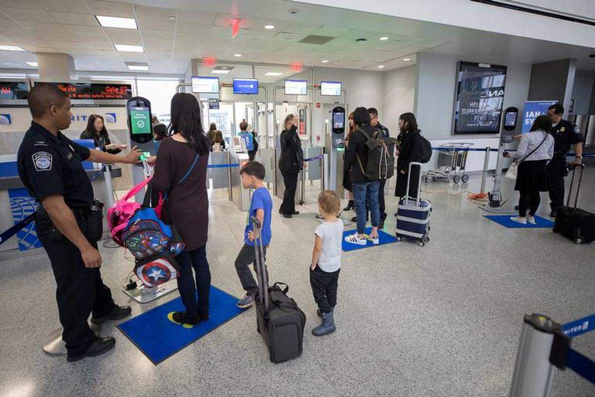 Donna Burton/U.S. Customs and Border Protection<br/>U.S. Customs and Border Protection, Office of Field Operations, officers take biometric photos of passengers prior to boarding a flight at Houston International Airport on February 12, 2018.