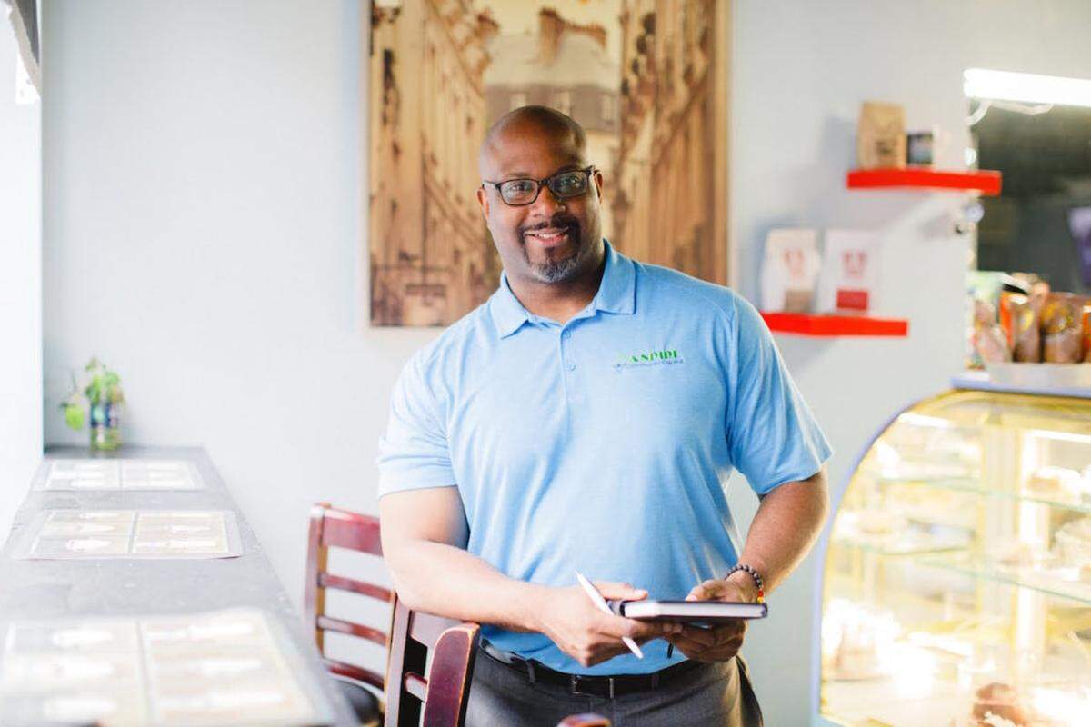 Julia Fay Photography<br>Manuel Campbell of Aspire Community Capital