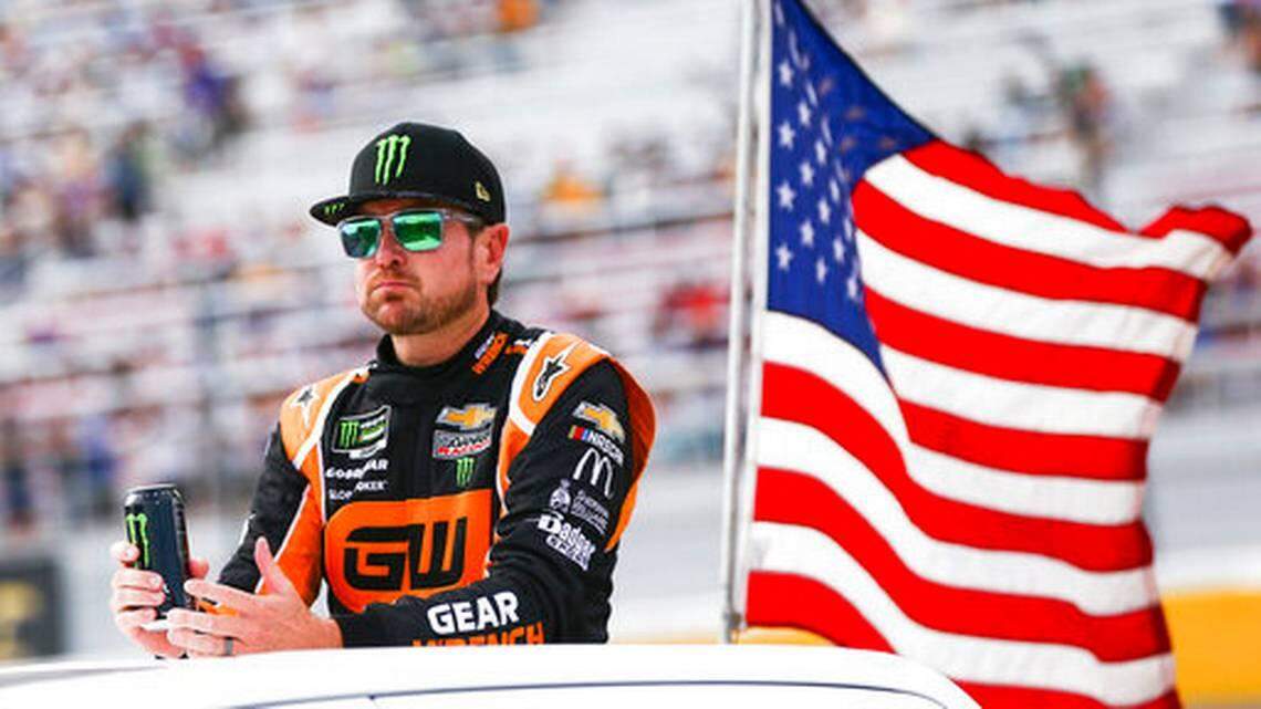 Kurt Busch looks on before a NASCAR Cup Series auto race at Las Vegas Motor Speedway in September.
