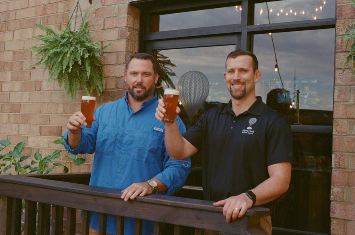 Courtesy of Sugar Creek Brewing Co.<br/>From left, Eric Flanigan and Joe Vogelbacher, co-owners of Sugar Creek Brewing Co.