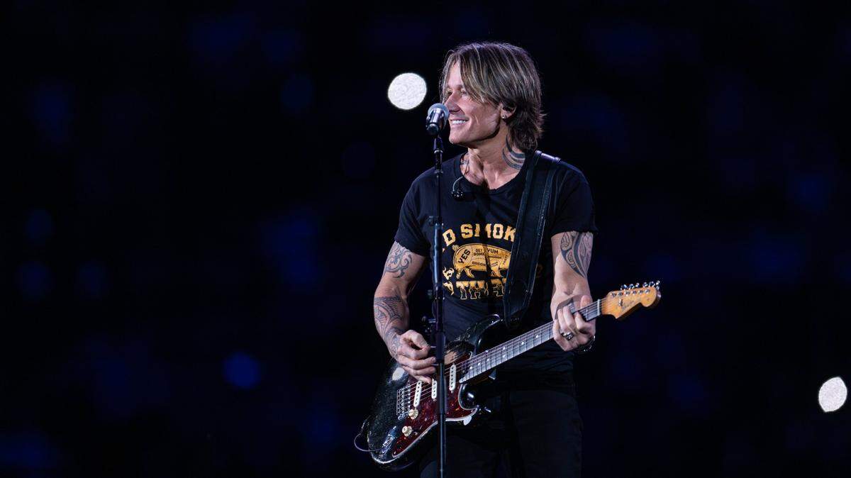 Keith Urban performs during Concert for Carolina at Bank of America Stadium in Charlotte on Saturday, Oct. 26, 2024.