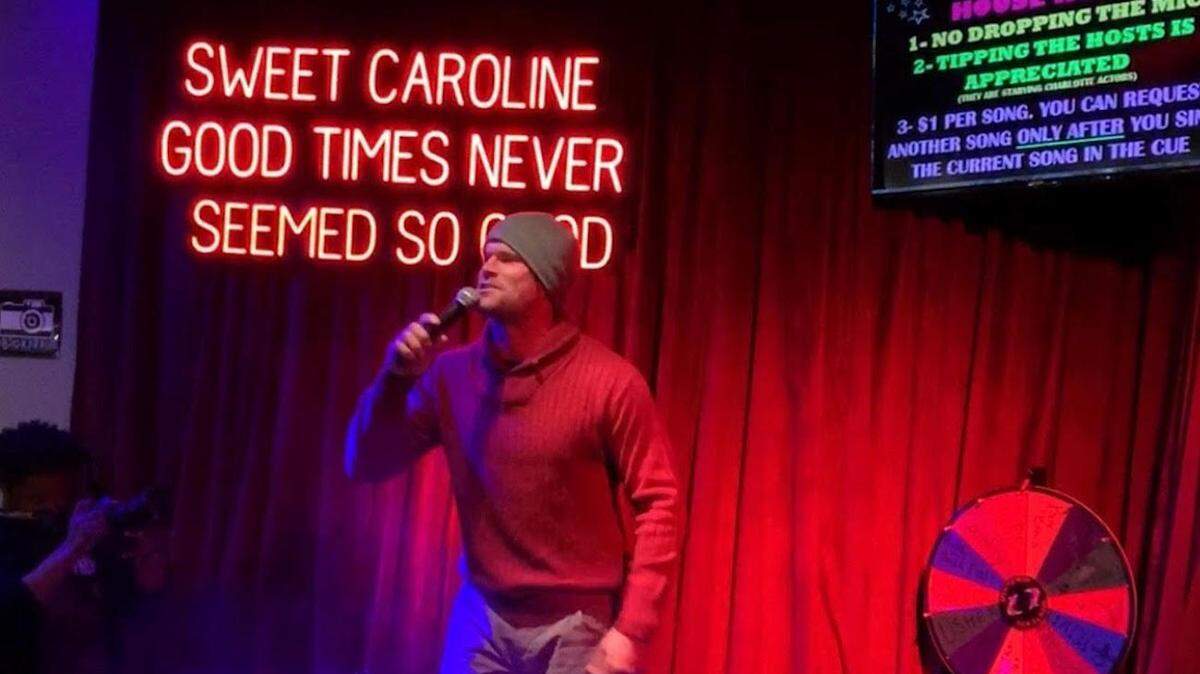 Courtesy of 8.2.0 Pizzeria & Bar<br>Greg Olsen sings karaoke at 8.2.0 Pizzeria & Bar.