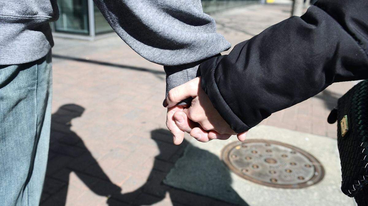 Mike Mayrosh (left), 24, and Ruth Lidoshore, 23, had their ten-month anniversary yesterday. "It's (Valentine's Day) just really special," Mayrosh said. "I found a great girl to share it with."
 Valentine's Day is a traditional day for a quiet meal with your loved one. Several couples had a Valentine's Day brunch at The Asbury in uptown Charlotte on Saturday February 14, 2015. Other couples enjoyed the sunny day simply walking and holding hands.