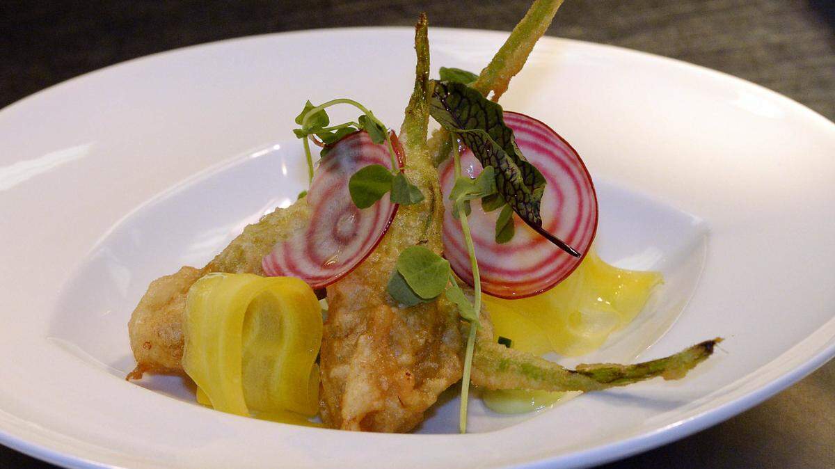 The Zucchini Flower is a speciality at Passion8 in the Elizabeth area of Charlotte on Thursday, July 2, 2015. Passion8 Executive Chef and Co-owner Luca Annunziata and Co-owner Jessica Annunziata,  share a passion for good, rustic-with-a-twist Italian food. and for Italy, where they lived together before moving to Charlotte to open their restaurant.
