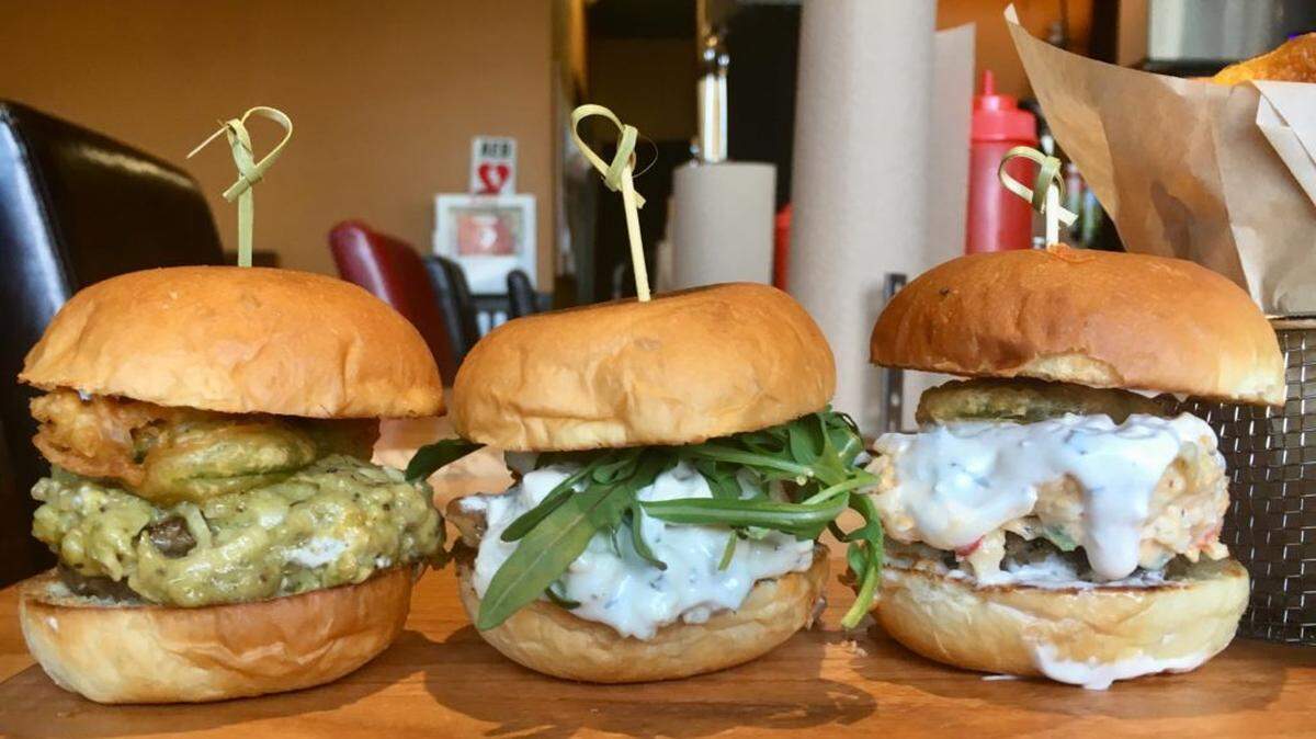 The Sriracha, the Bleu and Bacon Jam and The Pimento sliders. Photo by CharlotteFive