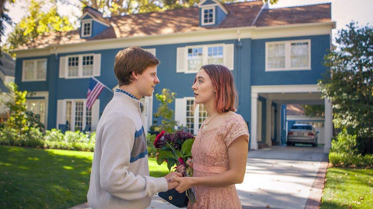 This image released by A24 Films shows Saoirse Ronan and Lucas Hedges in a scene from "Lady Bird." (Merie Wallace/A24 via AP)