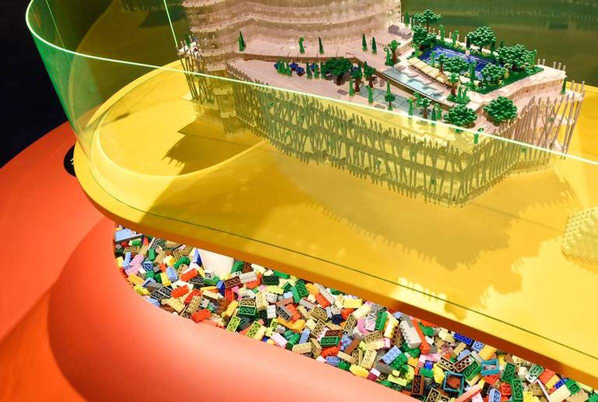 John Simmons / The Charlotte Observer<br/>About 250,000 Lego bricks sit in bins beneath the 20 skyscrapers built at Discovery Place, waiting for visitors to use them.